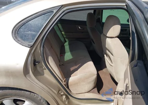 2000 Ford Taurus Se из США, поврежденный, VIN 1FAFP5325YA196898